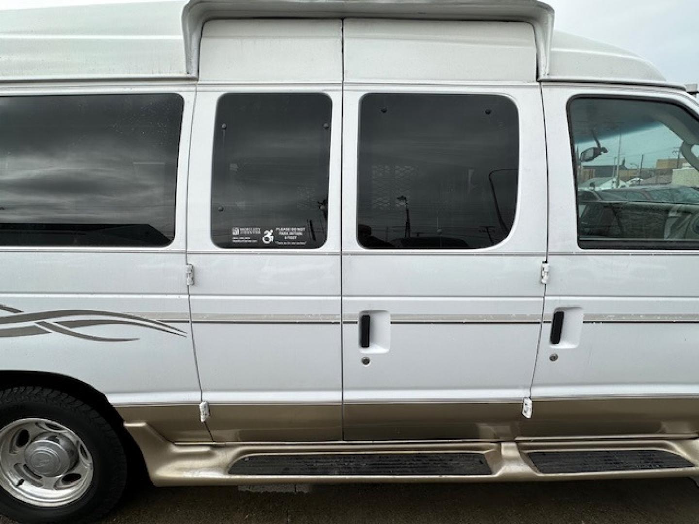 2017 White Ford E Series Van Tuscany Conversion with an 5.4 V8 engine, Automatic transmission, located at 3200 1st Avenue North, Billings, MT, 59101, (406) 245-9055, 45.779270, -108.510742 - Low Mileage, Handicap Accessible Custom Hi-Roof Van. Passenger Side Power Lift with Cargo Doors, 5.4 V8, Running Boards, Designed By Mobility Of Denver and Only 81,000 Miles. CarFax Dealer. Auto Brokers of Montana/AA&A Auto Rental/Fox Car Rental Billings - Photo#0